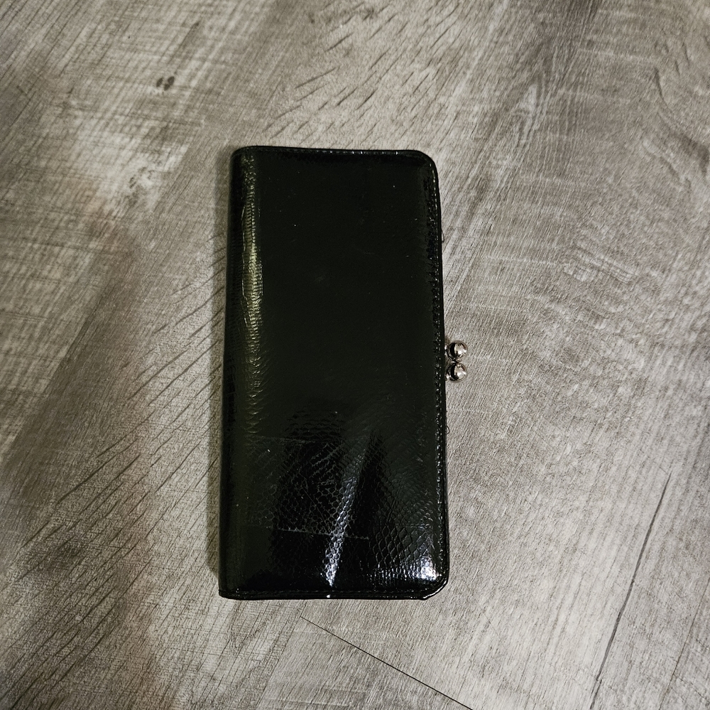 Faux Leather Blk Patent Wallet with snap close change compartment. Good Conditio